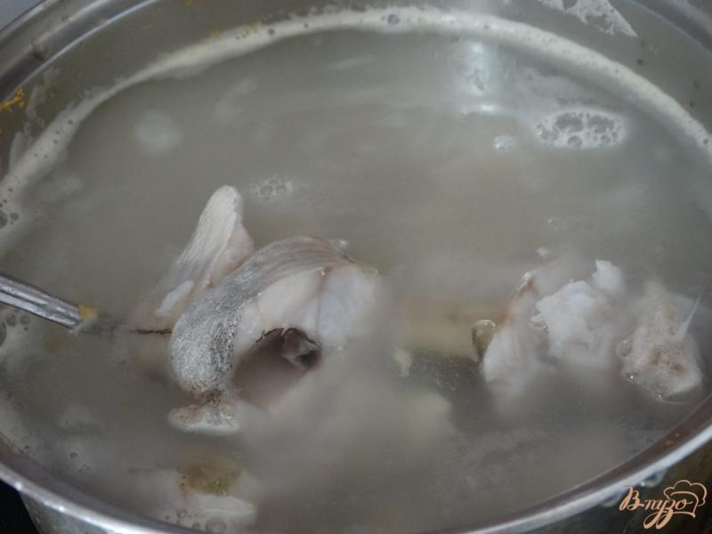 Фото приготовление рецепта: Рыбный суп с минтаем шаг №6