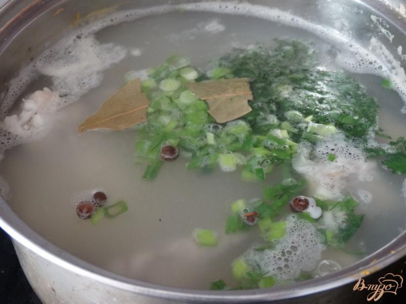Фото приготовление рецепта: Рыбный суп с минтаем шаг №7