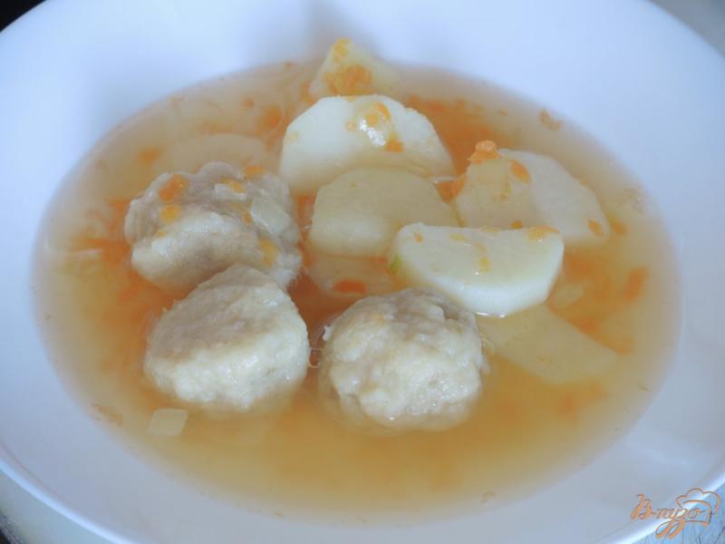 Фото приготовление рецепта: Суп с рыбными фрикадельками шаг №11