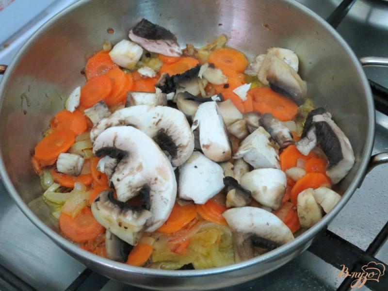 Фото приготовление рецепта: Икра из баклажанов с грибами шаг №7