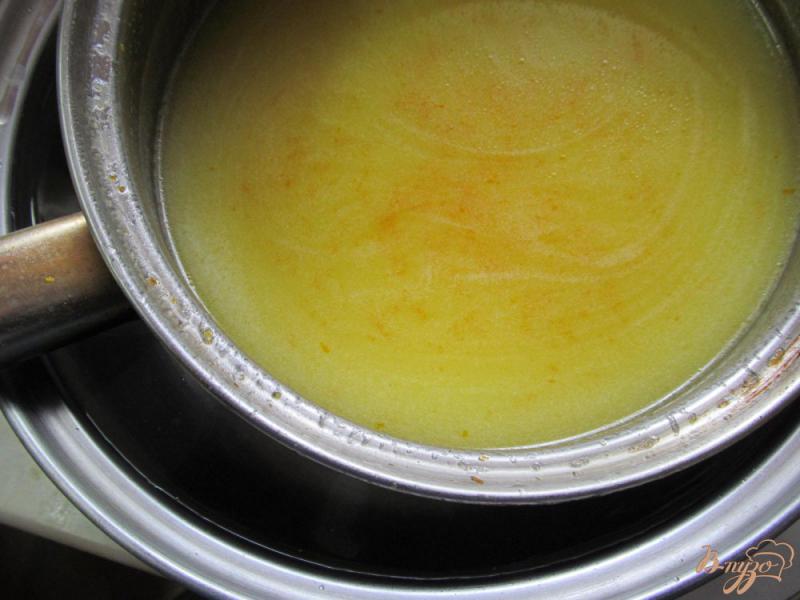 Фото приготовление рецепта: Сгущенное молоко с цедрой апельсина и ванилью шаг №3
