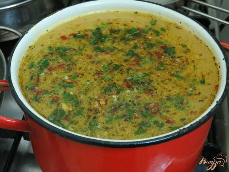 Фото приготовление рецепта: Куриный суп с рисом шаг №5