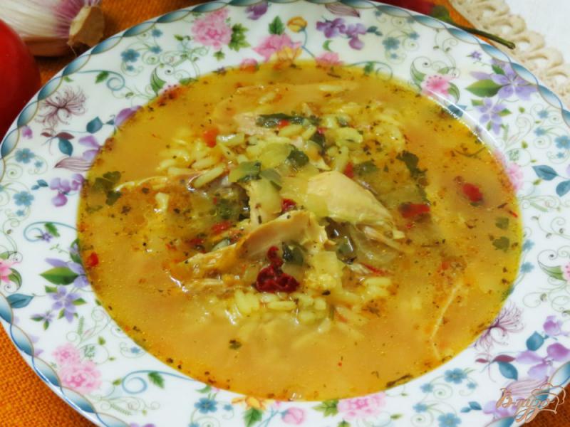Фото приготовление рецепта: Куриный суп с рисом шаг №6