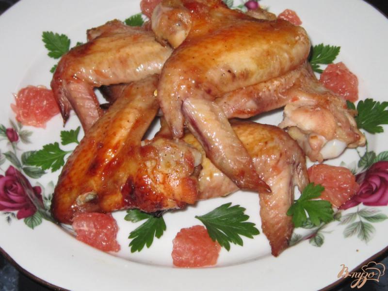 Фото приготовление рецепта: Крылышки в грейпфрутово-медовом маринаде шаг №6