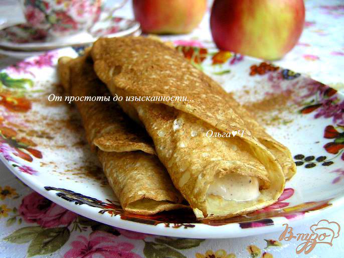 Фото приготовление рецепта: Блинчики с яблоками и корицей в сметанном креме шаг №7