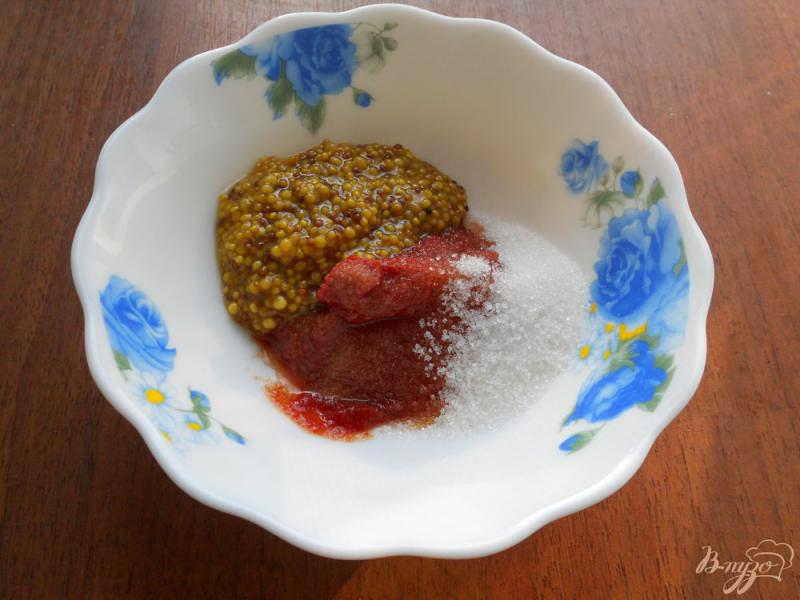 Фото приготовление рецепта: Свиные ребрышки тушеные в горчично-томатном соусе шаг №3