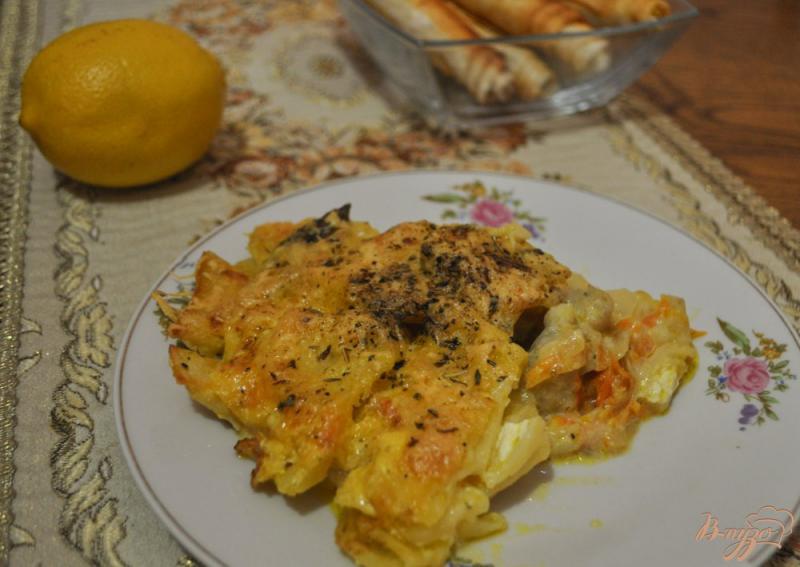 Фото приготовление рецепта: Картофель с хеком запеченный под сыром шаг №7