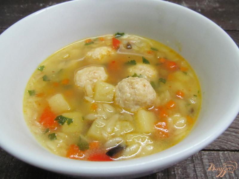 Фото приготовление рецепта: Овощной суп с фрикаделькам и пастой орзо шаг №11
