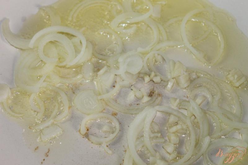 Фото приготовление рецепта: Свиные ушы тушенные в соевом соусе с добавлением французской горчицей шаг №4