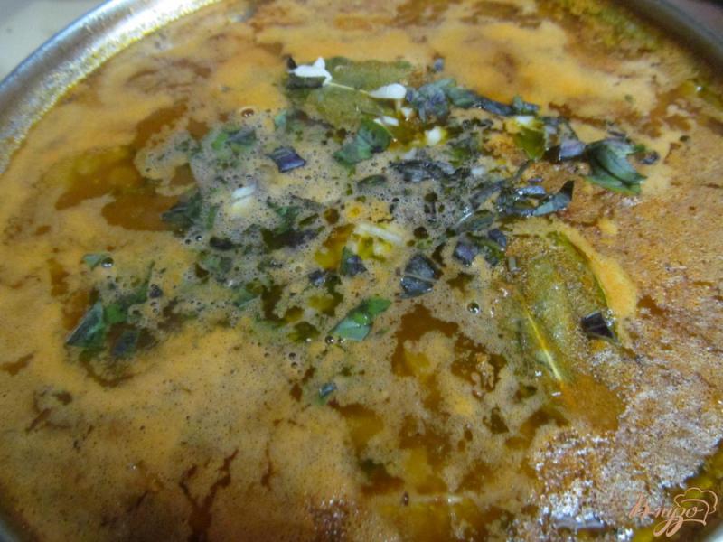 Фото приготовление рецепта: Суп с килькой в томате рисом и пшеном шаг №6