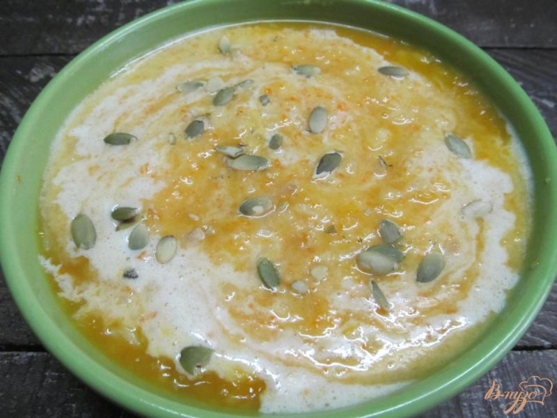 Фото приготовление рецепта: Рисовая каша с тыквой и мандарином шаг №5