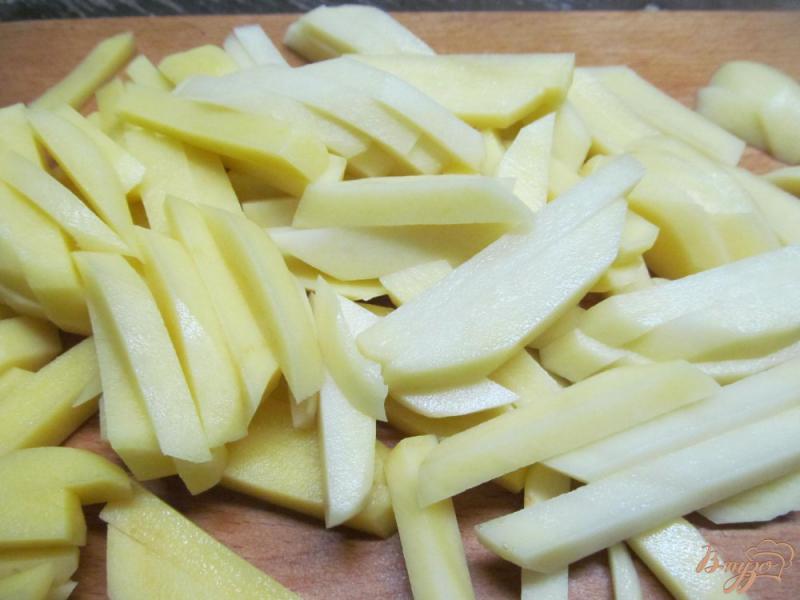 Фото приготовление рецепта: Жареный картофель в тыквой шаг №1