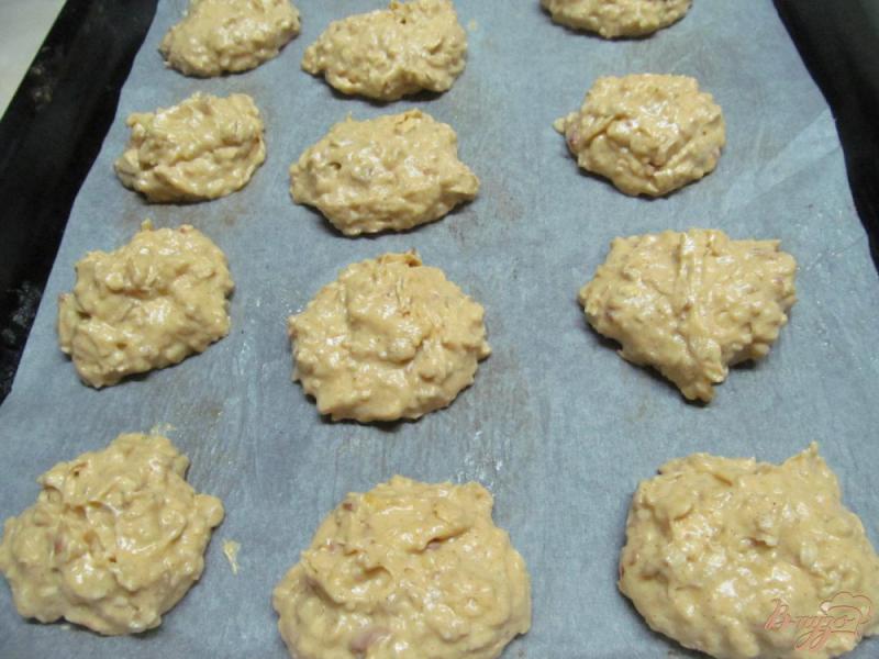 Фото приготовление рецепта: Овсяное печенье с тыквой и арахисом шаг №5