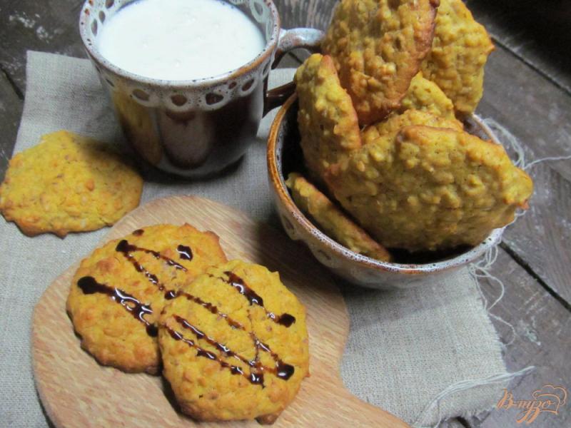 Фото приготовление рецепта: Овсяное печенье с тыквой и арахисом шаг №7
