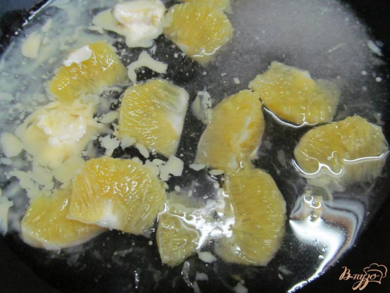 Фото приготовление рецепта: Шоколадные блины под апельсиновым соусом шаг №5