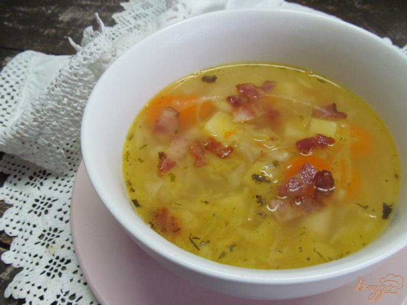 Фото приготовление рецепта: Овощной суп с квашенной капустой на беконе шаг №10