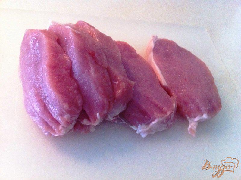 Фото приготовление рецепта: Отбивная из свинины в геркулесовых хлопьях шаг №2