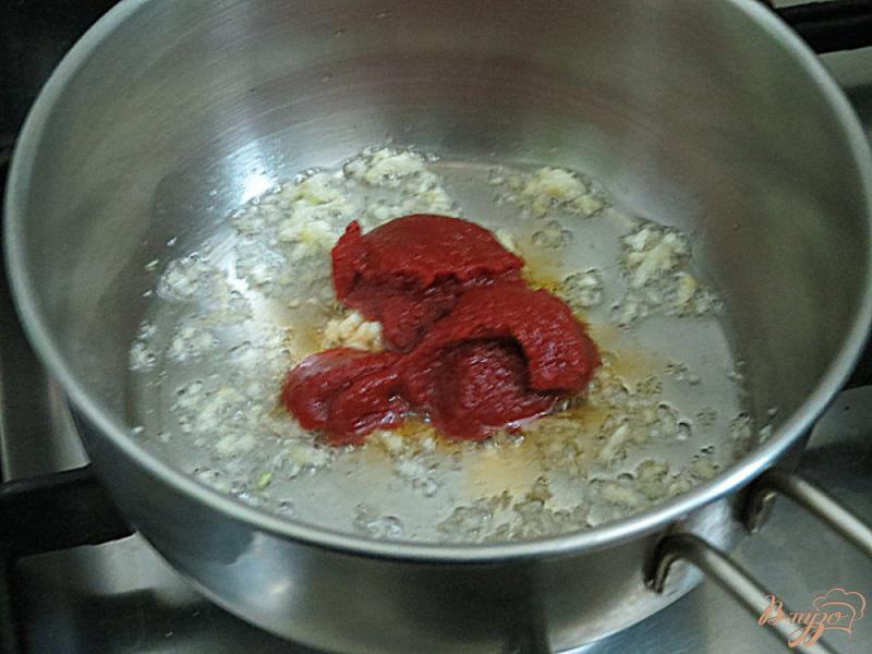 Фото приготовление рецепта: Острый томатно-чесночный соус шаг №6