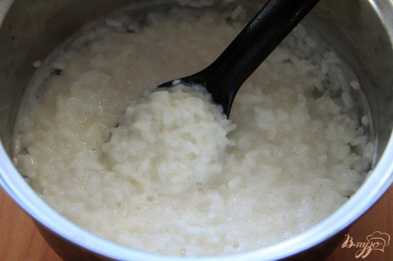 Фото приготовление рецепта: Рассыпчатая рисовая каша на молоке шаг №7
