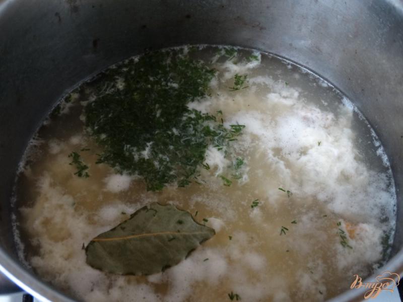 Фото приготовление рецепта: Рыбный суп с мидиями шаг №4