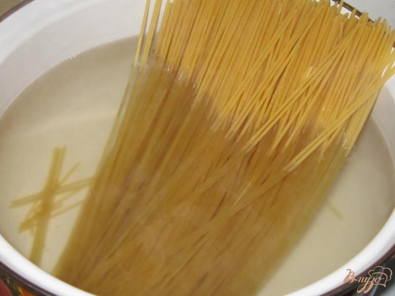 Фото приготовление рецепта: Свинина в нежном соусе со спагетти шаг №9