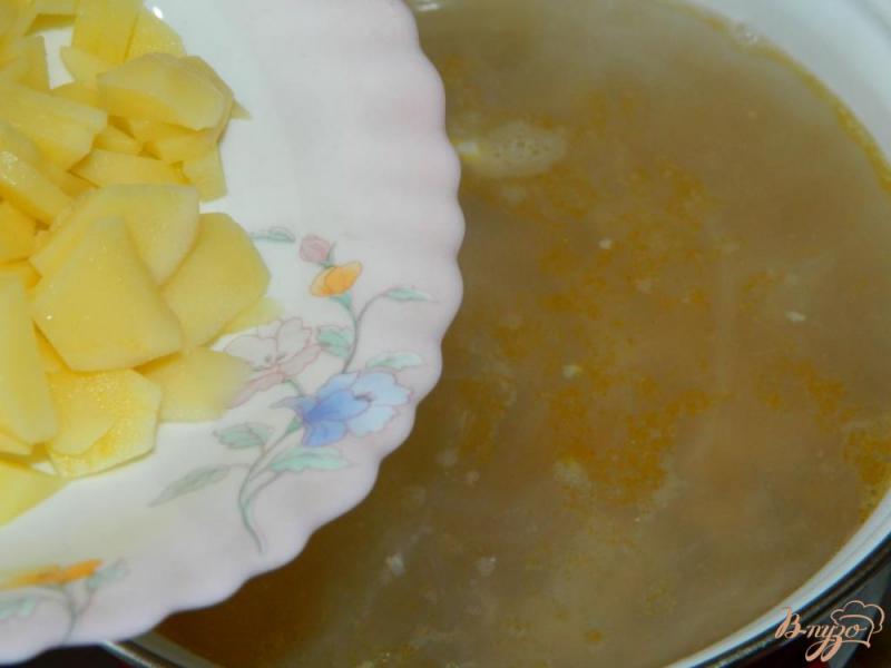 Фото приготовление рецепта: Куриный суп с гречкой шаг №4