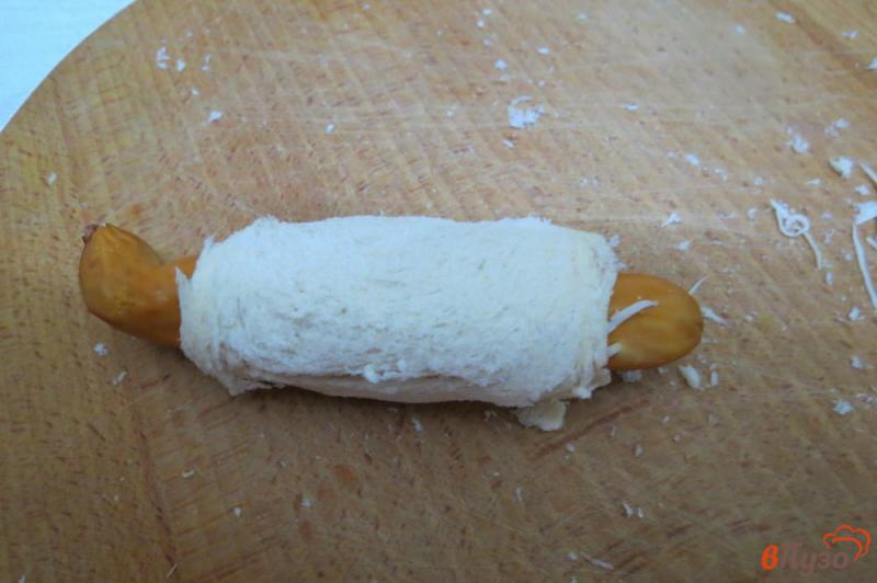 Фото приготовление рецепта: Сосиски в хлебе для тостов шаг №10