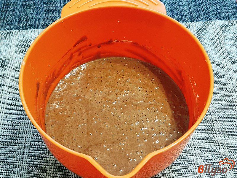 Фото приготовление рецепта: Пудинги из горького шоколада шаг №6