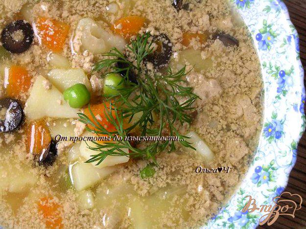 фото рецепта: Суп с печенью минтая, мартини и маслинами