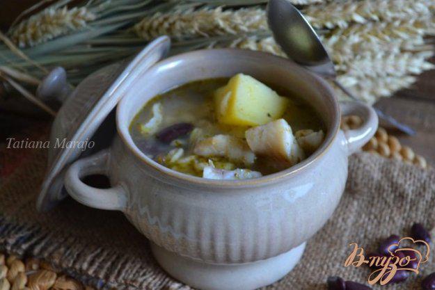 фото рецепта: Густой суп с рыбой, крупами и фасолью