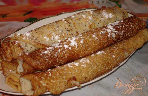 фото рецепта: Венгерские маковые блины с изюмом, орехом и медом