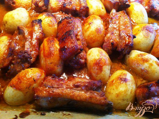 фото рецепта: Свиные ребра в кисло-сладком маринаде с картофелем