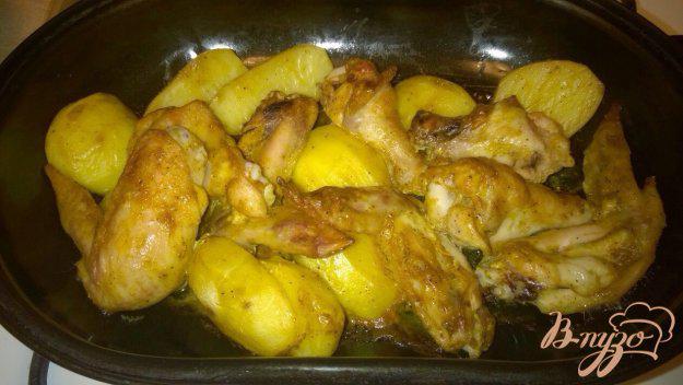 фото рецепта: Куриные крылышки с картошкой