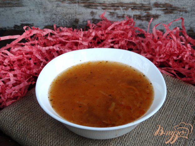 фото рецепта: Суп с квашеной капустой, опятами и кус-кусом