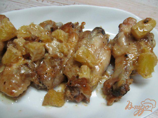 фото рецепта: Куриные крылья под мандарином