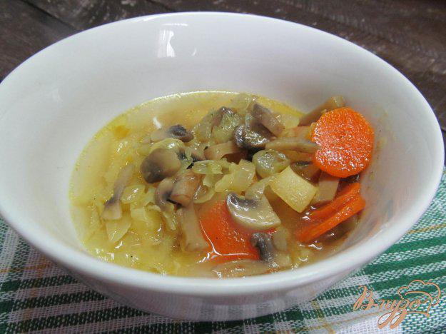фото рецепта: Суп с грибами и капустой