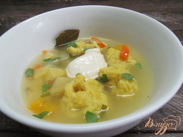 фото рецепта: Суп с клецками из пшена и чеснока