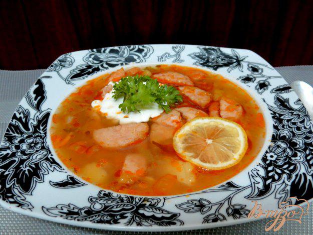 фото рецепта: Суп с колбасой и солёными огурцами