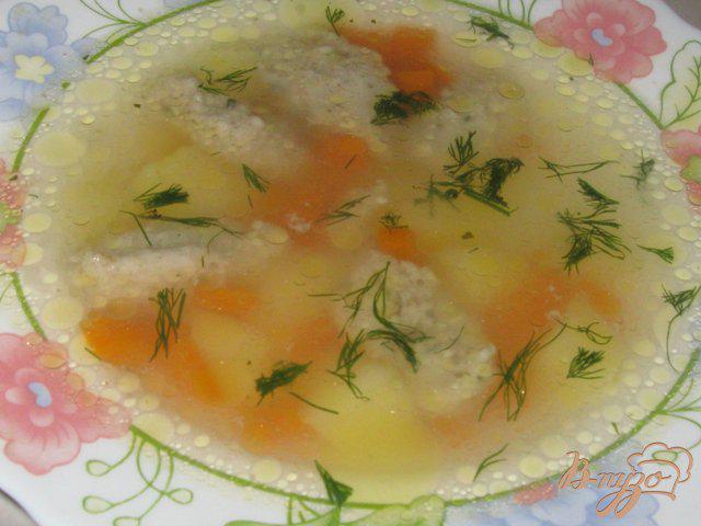 Фото приготовление рецепта: Легкий суп с овсяными клецками шаг №6