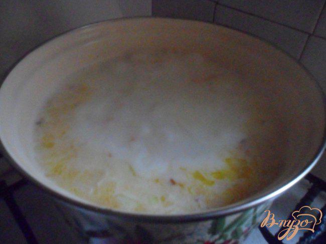 Фото приготовление рецепта: Сырный суп с рисом шаг №7