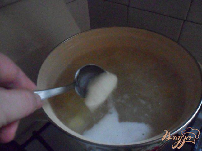 Фото приготовление рецепта: Сырный суп с рисом шаг №6