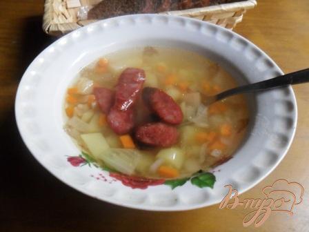 Фото приготовление рецепта: Картофельный суп с колбасками шаг №7