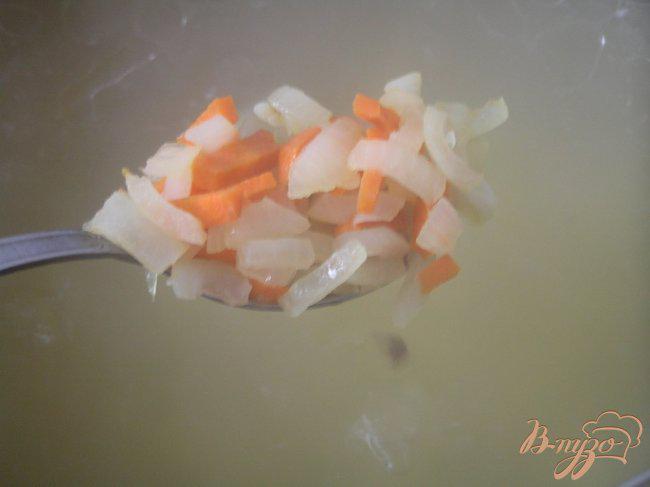 Фото приготовление рецепта: Щи из кислой капусты со свининой шаг №5