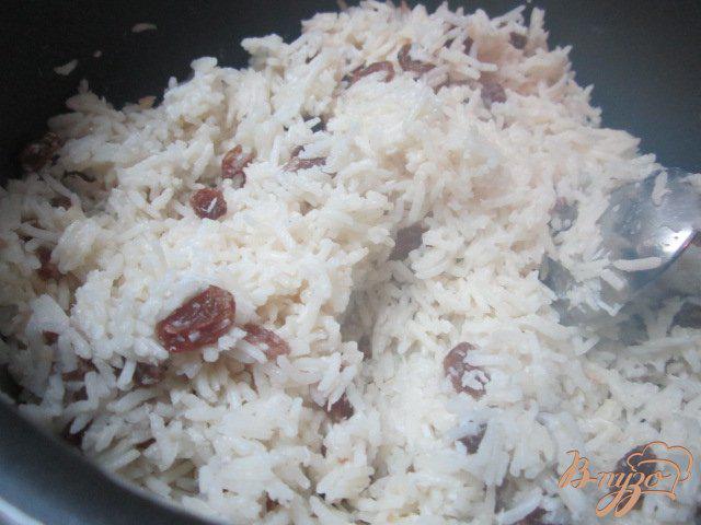 Фото приготовление рецепта: Кокосовый рис с изюмом шаг №2