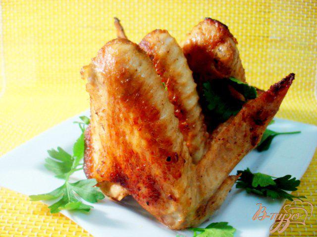 Фото приготовление рецепта: Куриные крылышки в лимонном маринаде. шаг №7