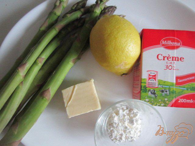 Фото приготовление рецепта: Зеленая спаржа с лимонным соусом шаг №1