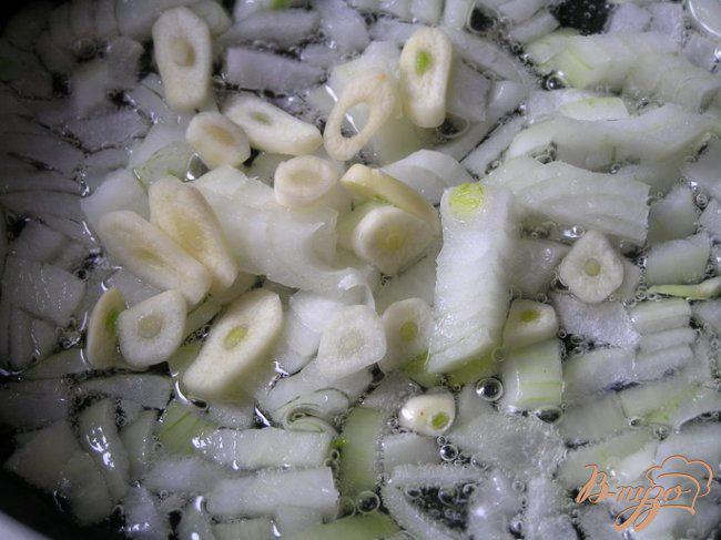 Фото приготовление рецепта: Кальмары, фаршированные мидиями, овощами и кус-кусом шаг №1