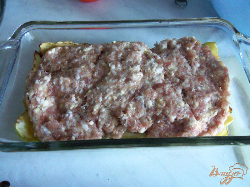 Фото приготовление рецепта: Запеканка из кабачков с фаршем под сливочным соусом шаг №8