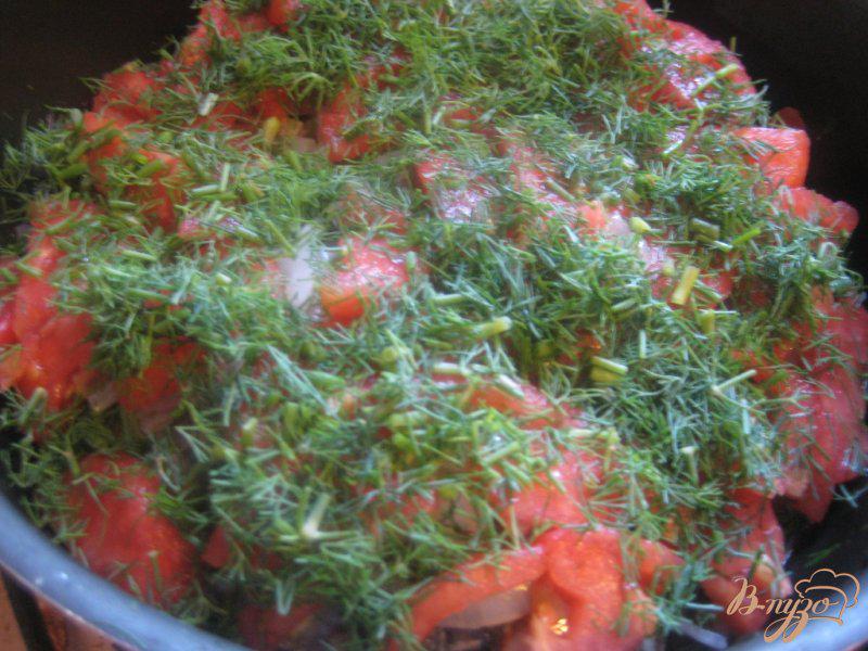 Фото приготовление рецепта: Рыба в помидорах шаг №9