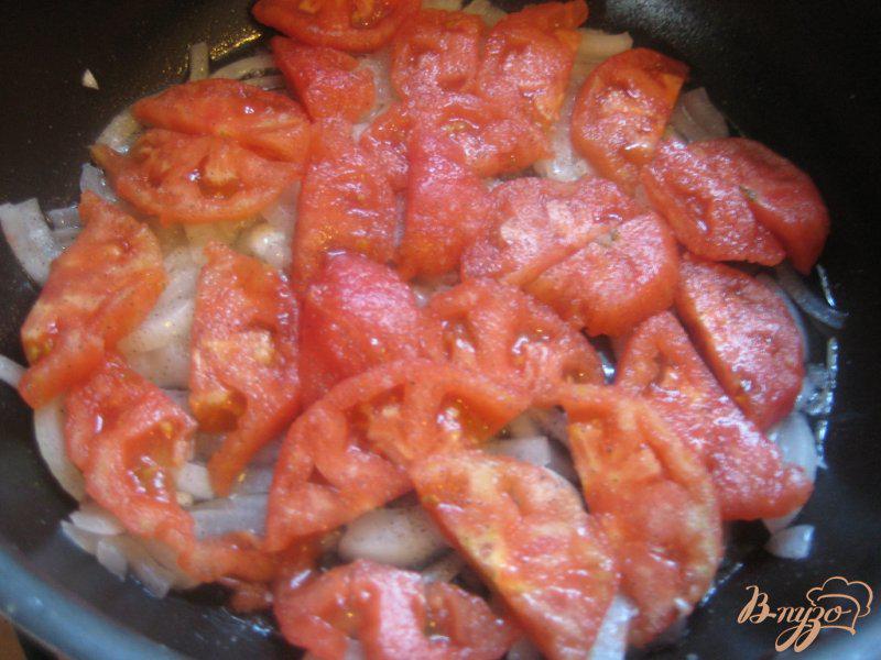 Фото приготовление рецепта: Рыба в помидорах шаг №7